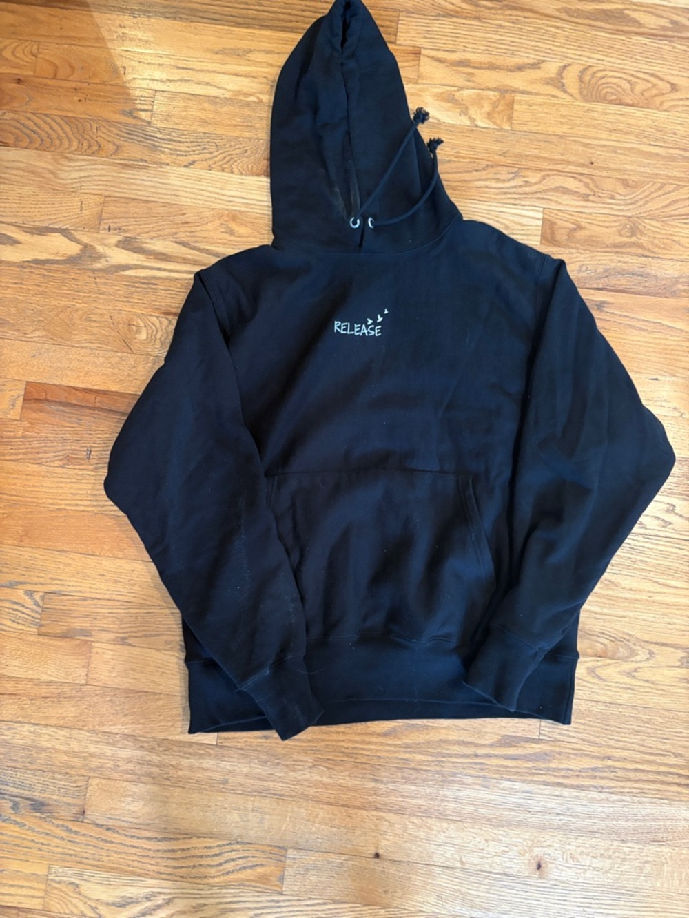 Black hooded sweatshirt “release” excellent condition size large